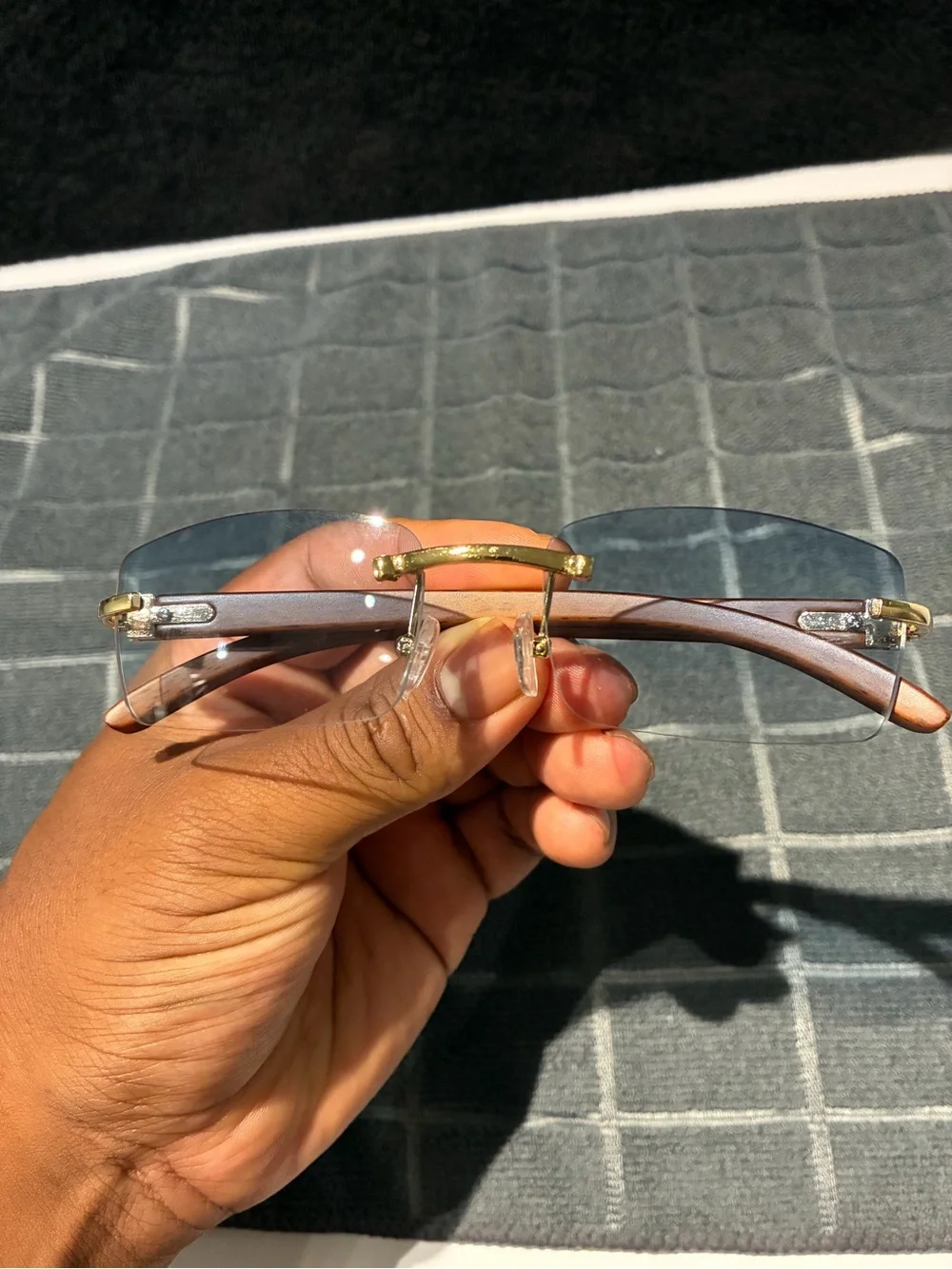 Rimless Blue Lens Sunglasses with Wood Arms and Gold Bridge